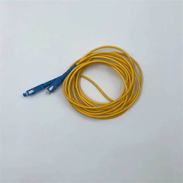 Is it true that fiber optic communication can transmit over long distances 